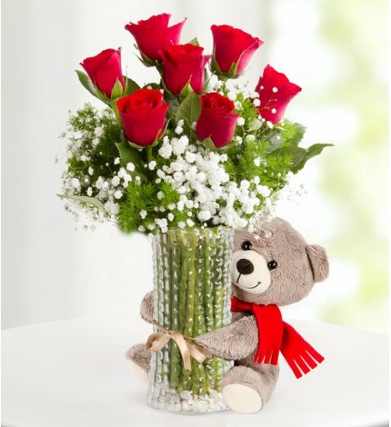 GÜLÜMSE SEVGİLİM KIRMIZI GÜL ARAJMANI